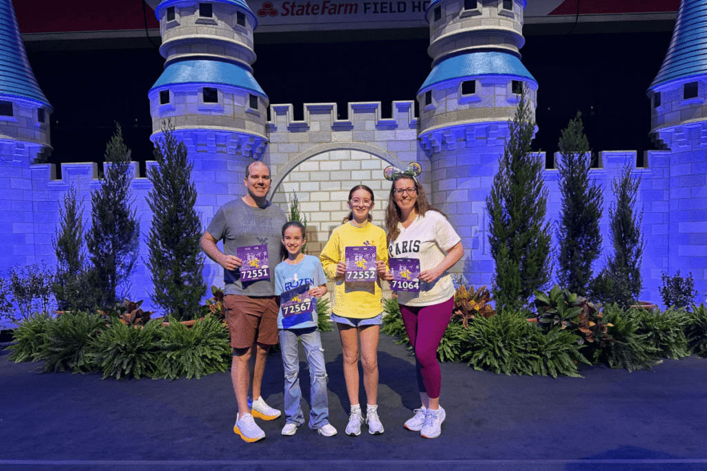 family in front of the castle deco at race expo